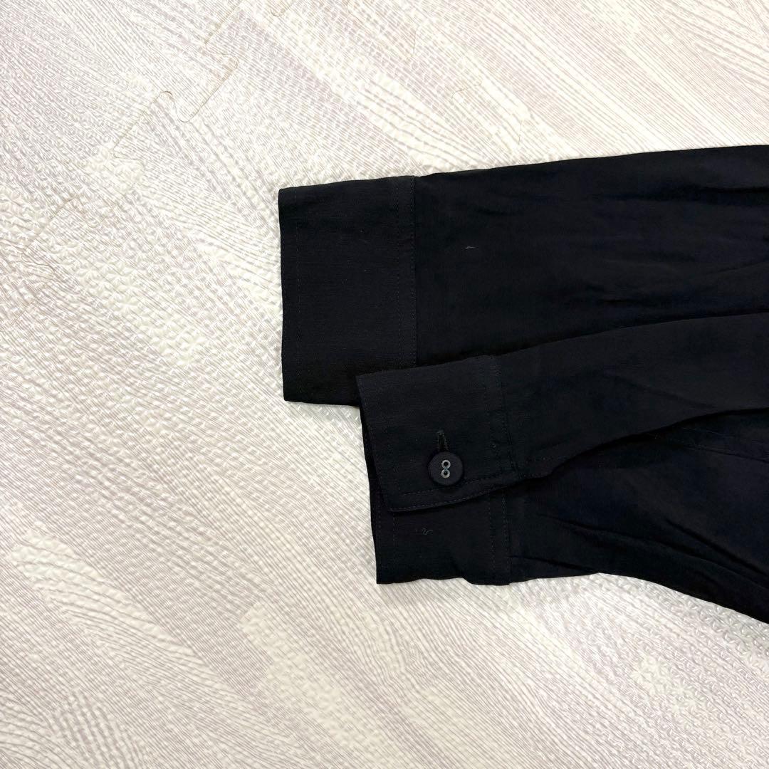 トクコプルミエヴォル✨デザインチュニック　ブラウス　総柄　音楽家　変形　9号