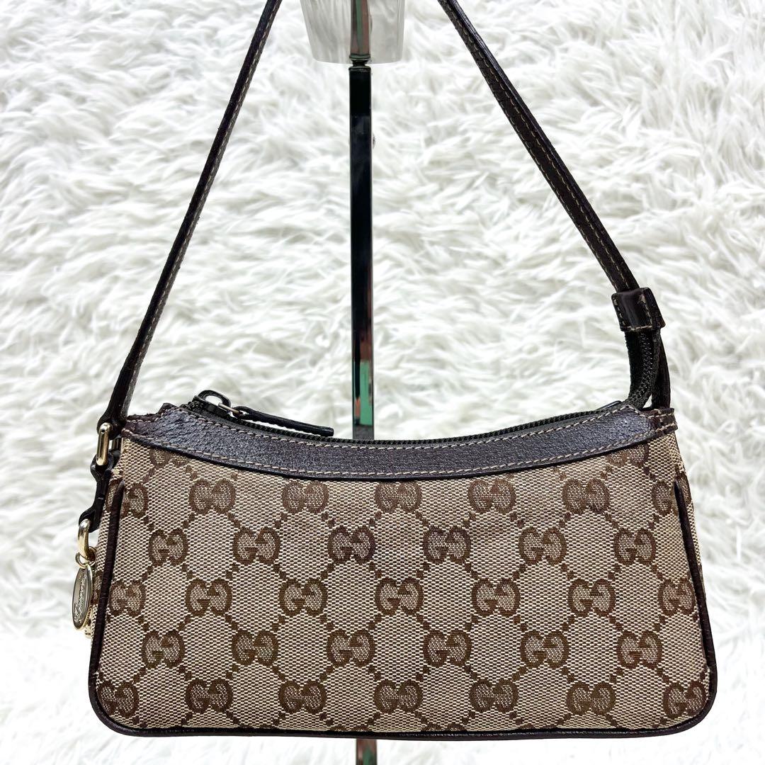 希少 グッチ アクセサリーポーチ ブーツチャーム GGキャンバス レザー