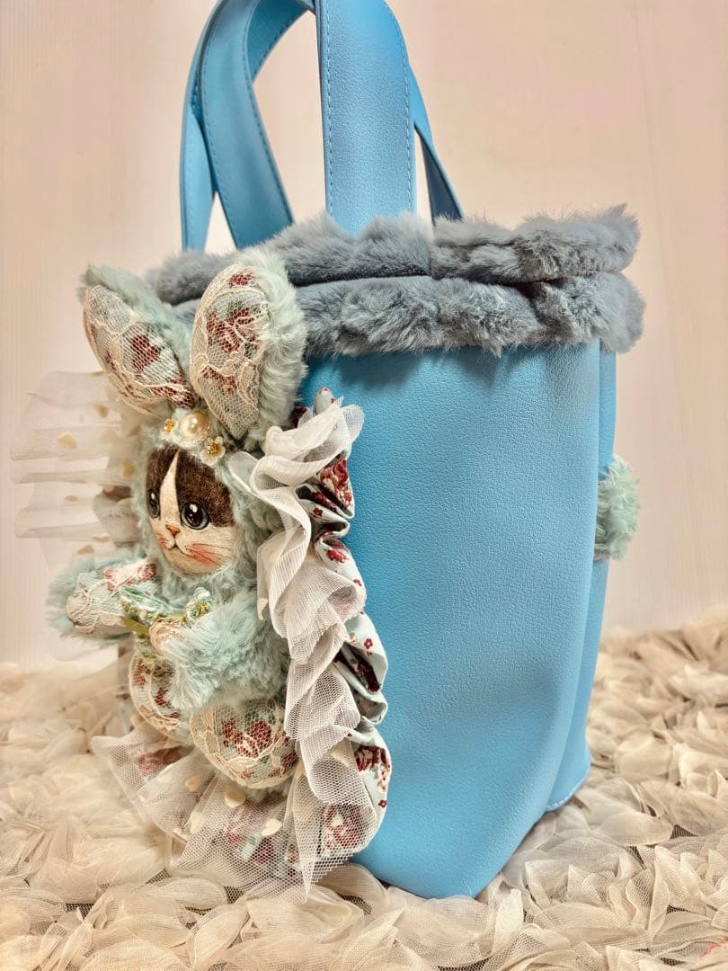 コヤンイサムチョン　フェイクレザーブルーのトートバッグ