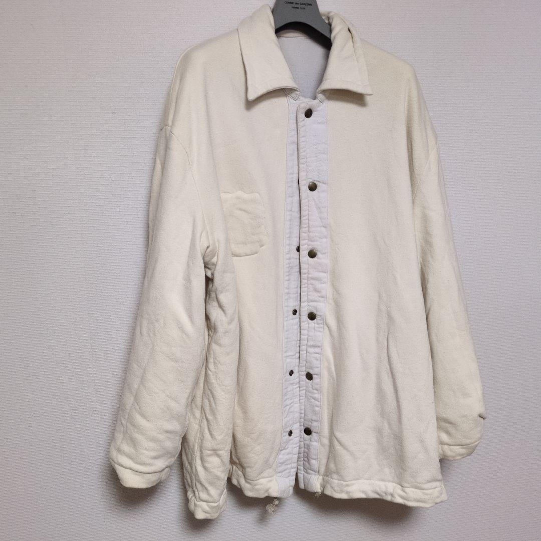 ホワイトカバーオール エンブレム付き