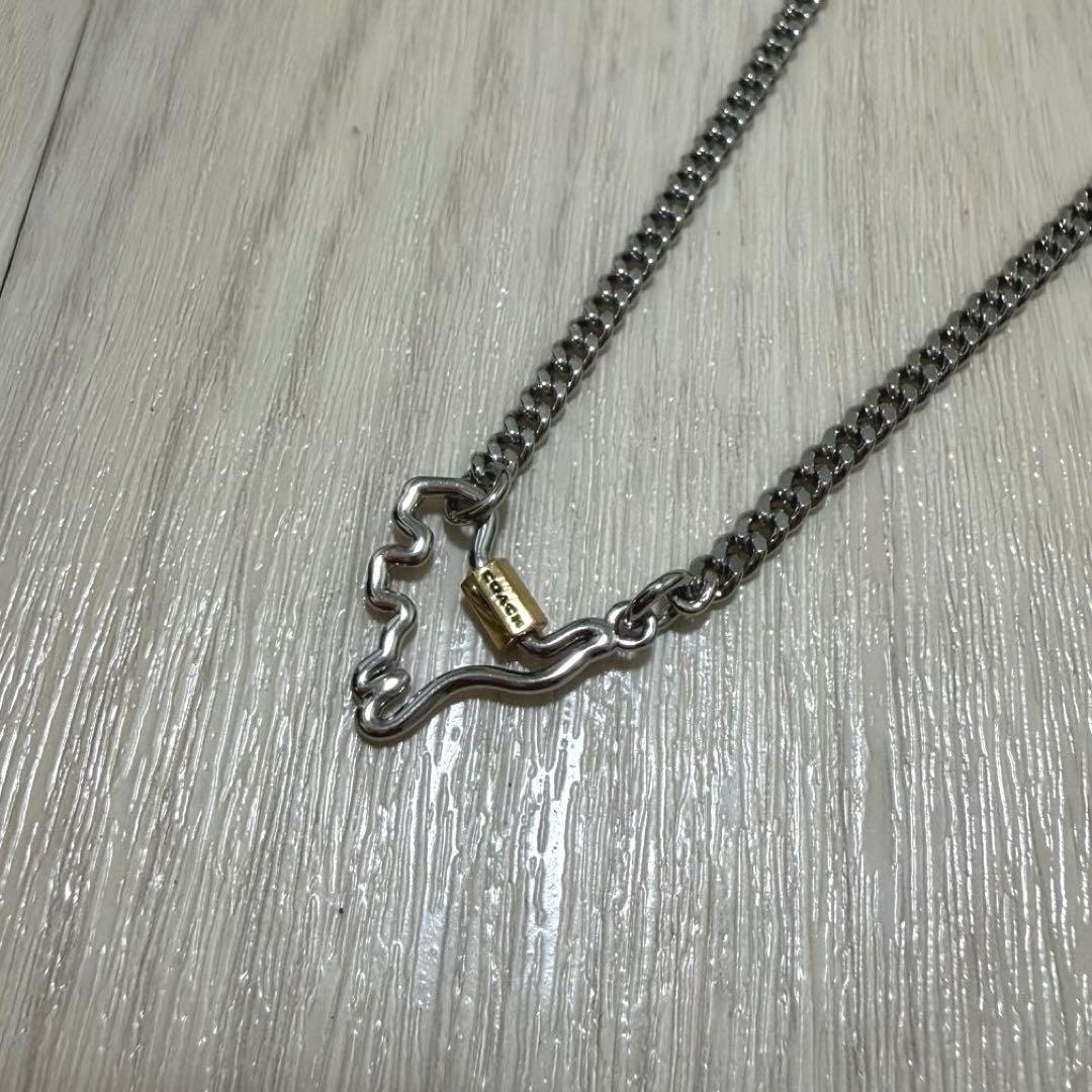 COACH レキシー ロゴ カラビナ 恐竜 ネックレス ペンダント ジルコニア