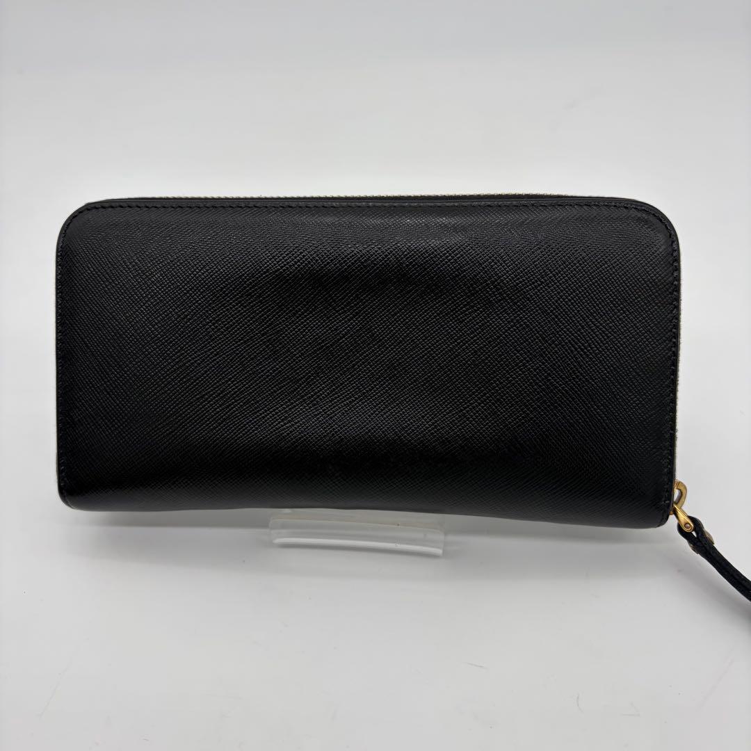 PRADA 長財布 ラウンドファスナー ロゴ金具 リボン サフィアーノレザー 黒