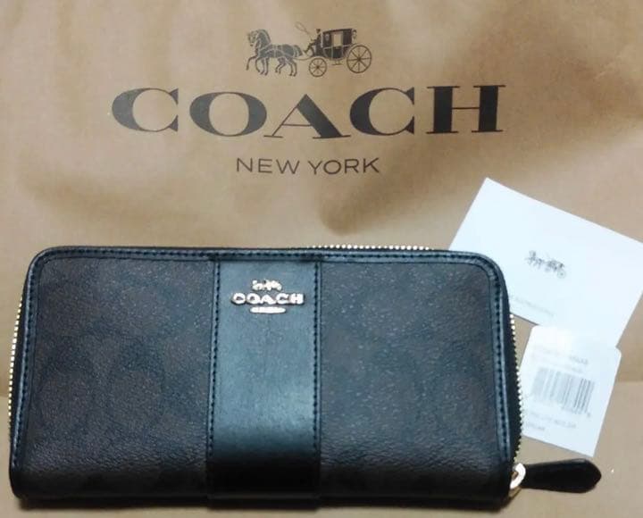新品未使用COACH コーチ 長財布ブラウンブラックシグネチャー