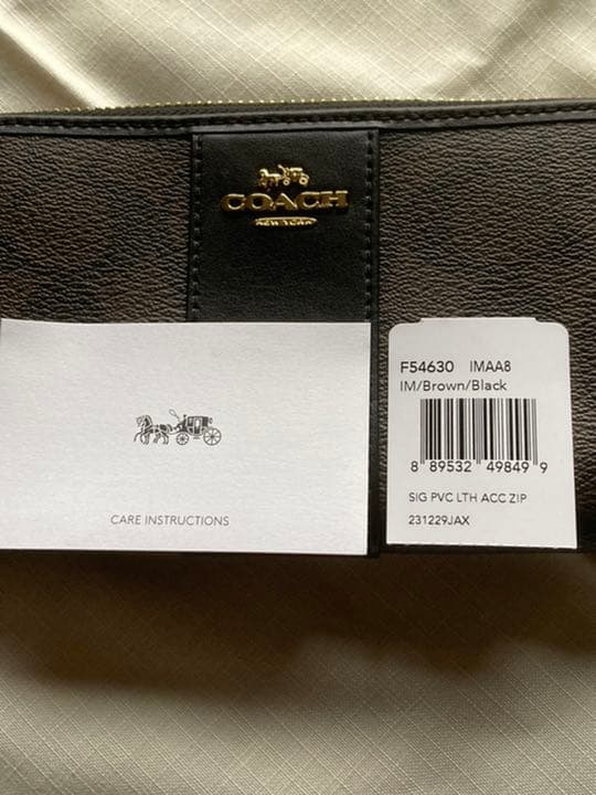 新品未使用COACH コーチ 長財布ブラウンブラックシグネチャー