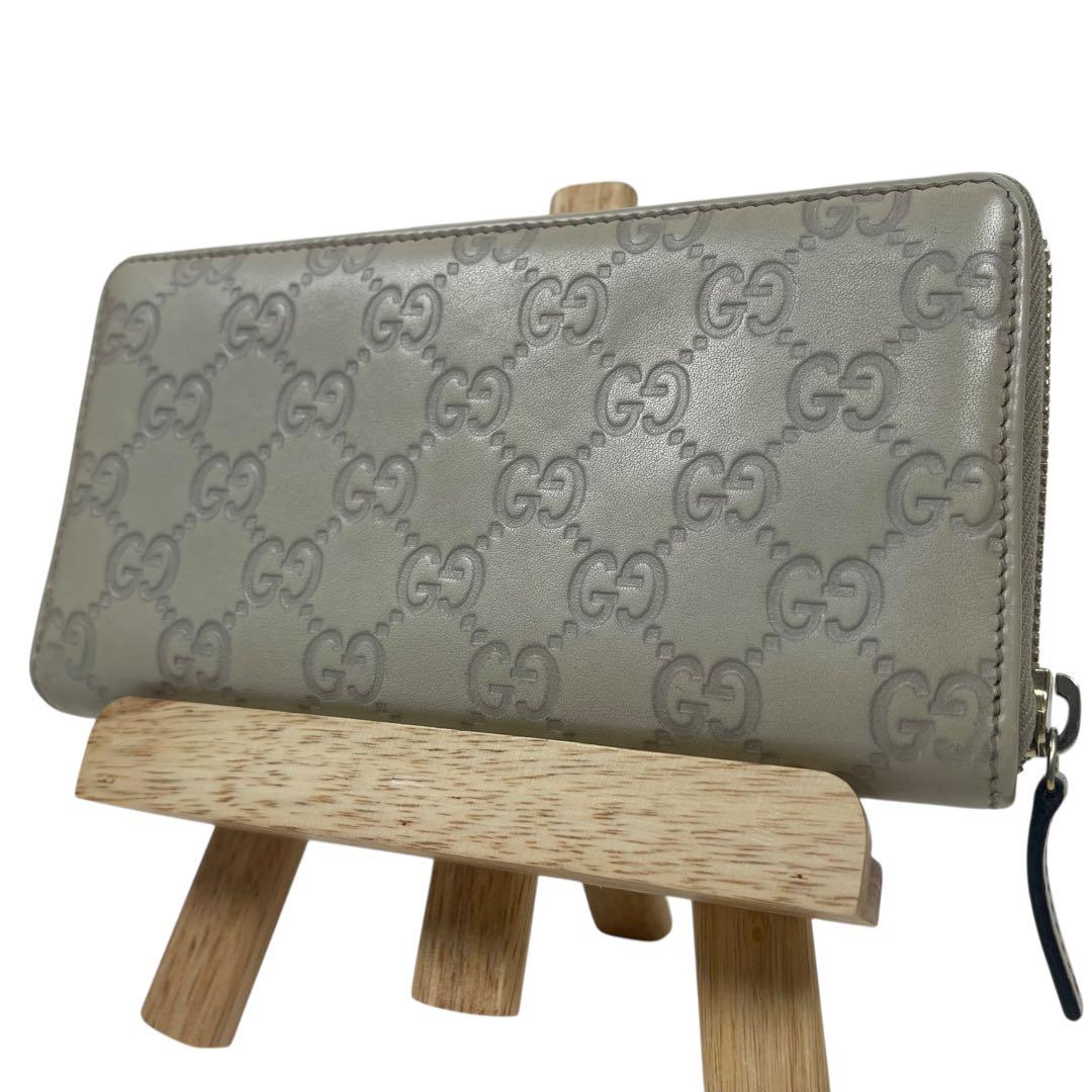 グッチ　長財布　GGシマレザー　ロゴプレート　ロゴ総柄　型押　ラウンドファスナー