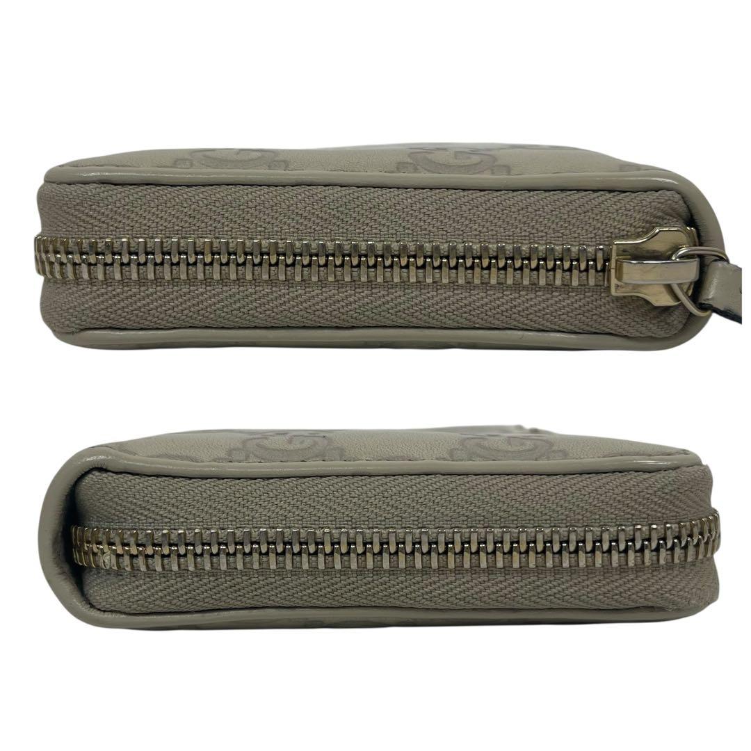 グッチ　長財布　GGシマレザー　ロゴプレート　ロゴ総柄　型押　ラウンドファスナー