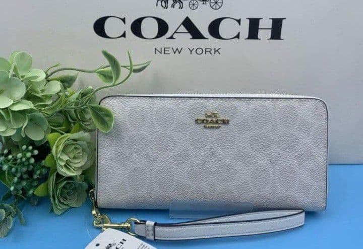 新品未使用コーチ長財布レディースホワイトシグネチャーロングジップ送料無料即日発送