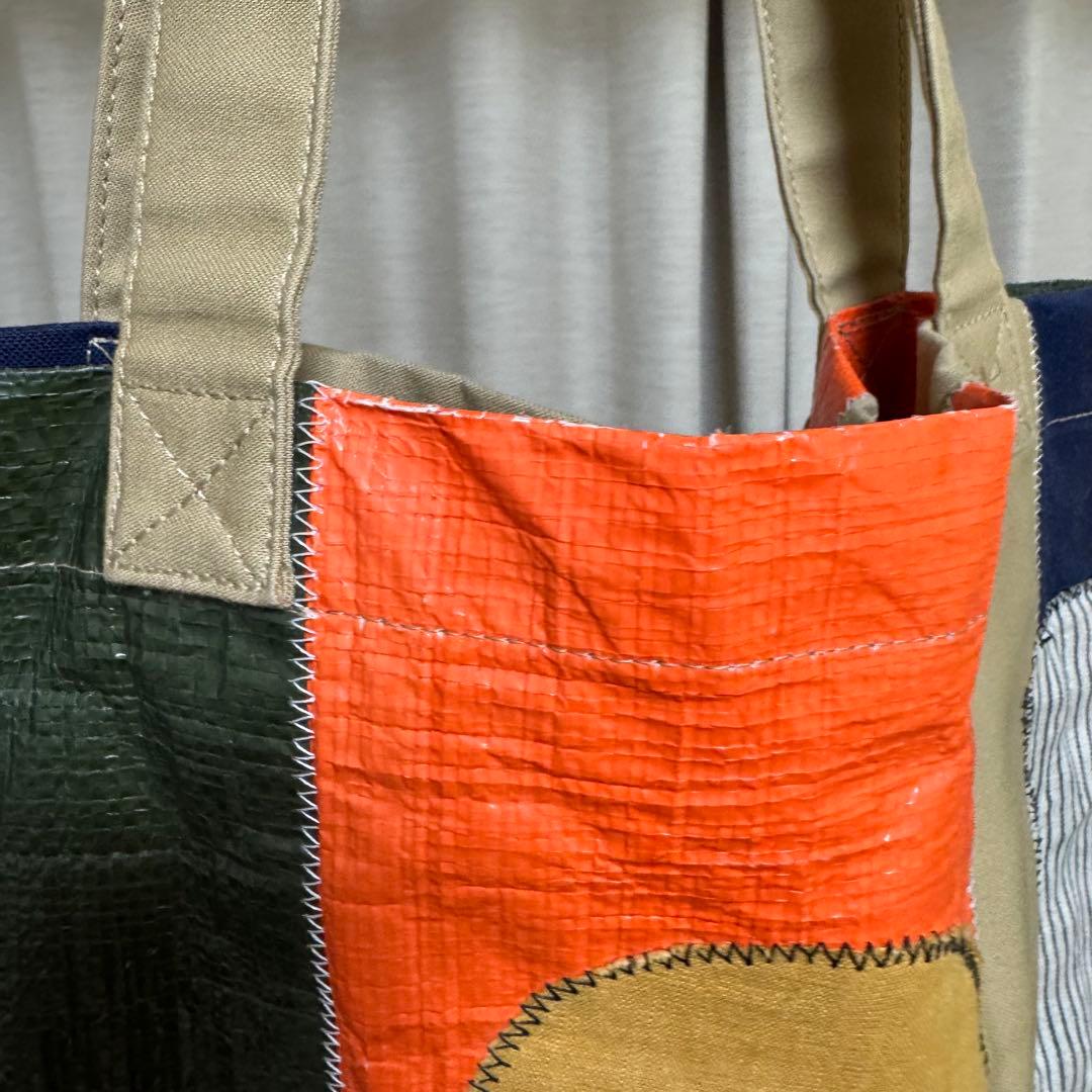 バッグ KHOKI 23AW Color-block vinyl tote bag