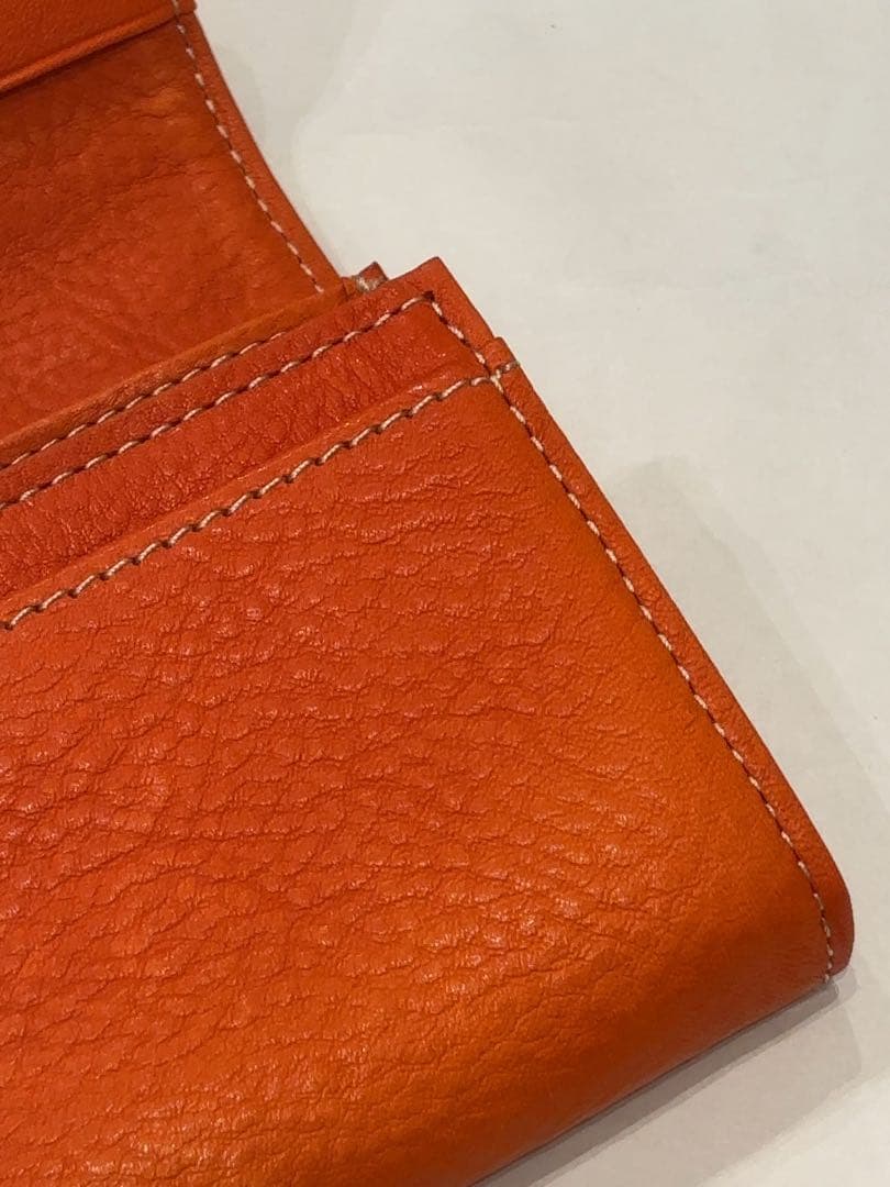 新品　ダコタ　イデーア　被せ　長財布　オレンジ　本革