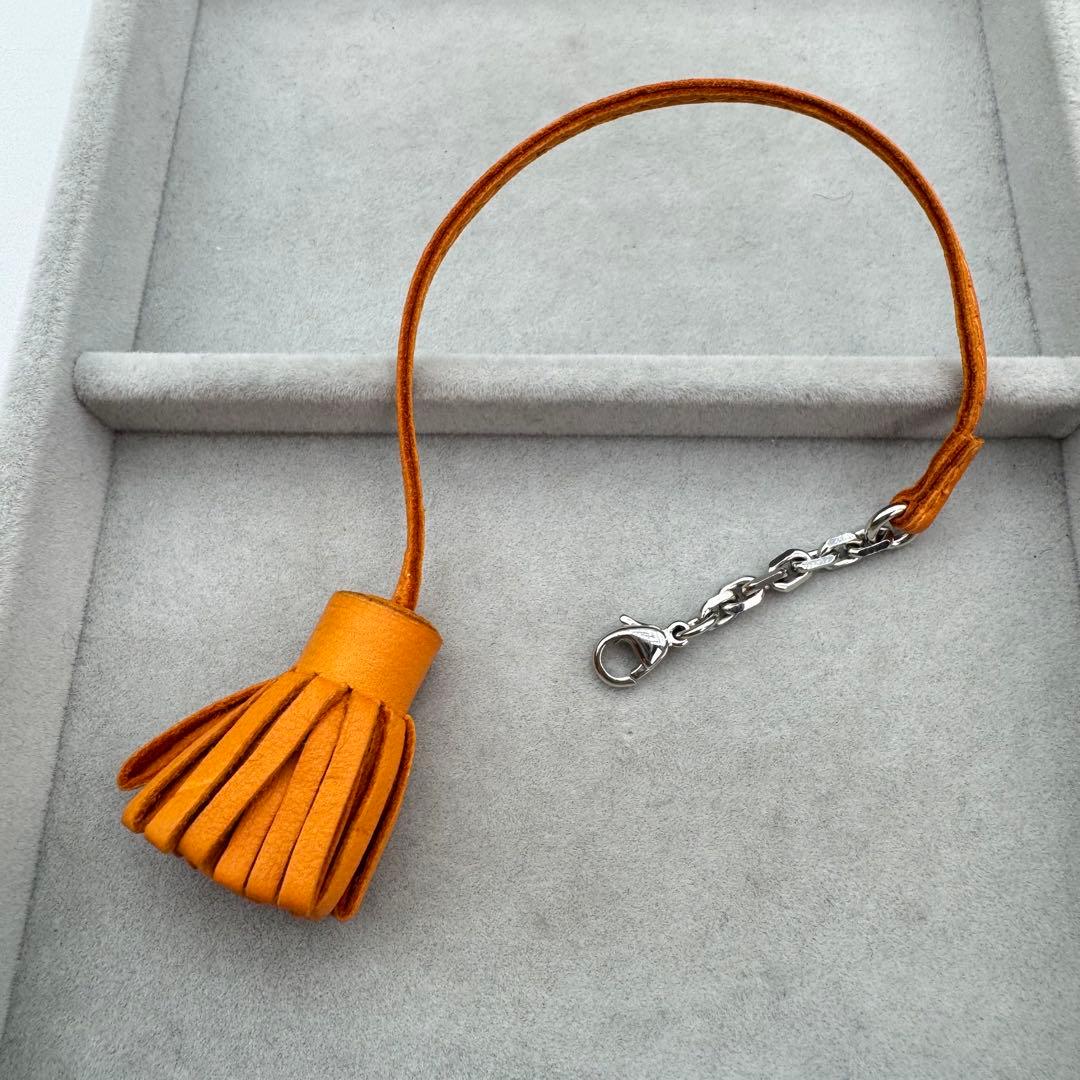 【定番】HERMES カルメンチータ　チャーム　フリンジ　しおり　オレンジ