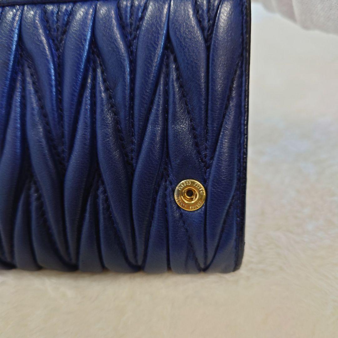 miu miu マテラッセ ネイビー 二つ折り長財布 5M1109