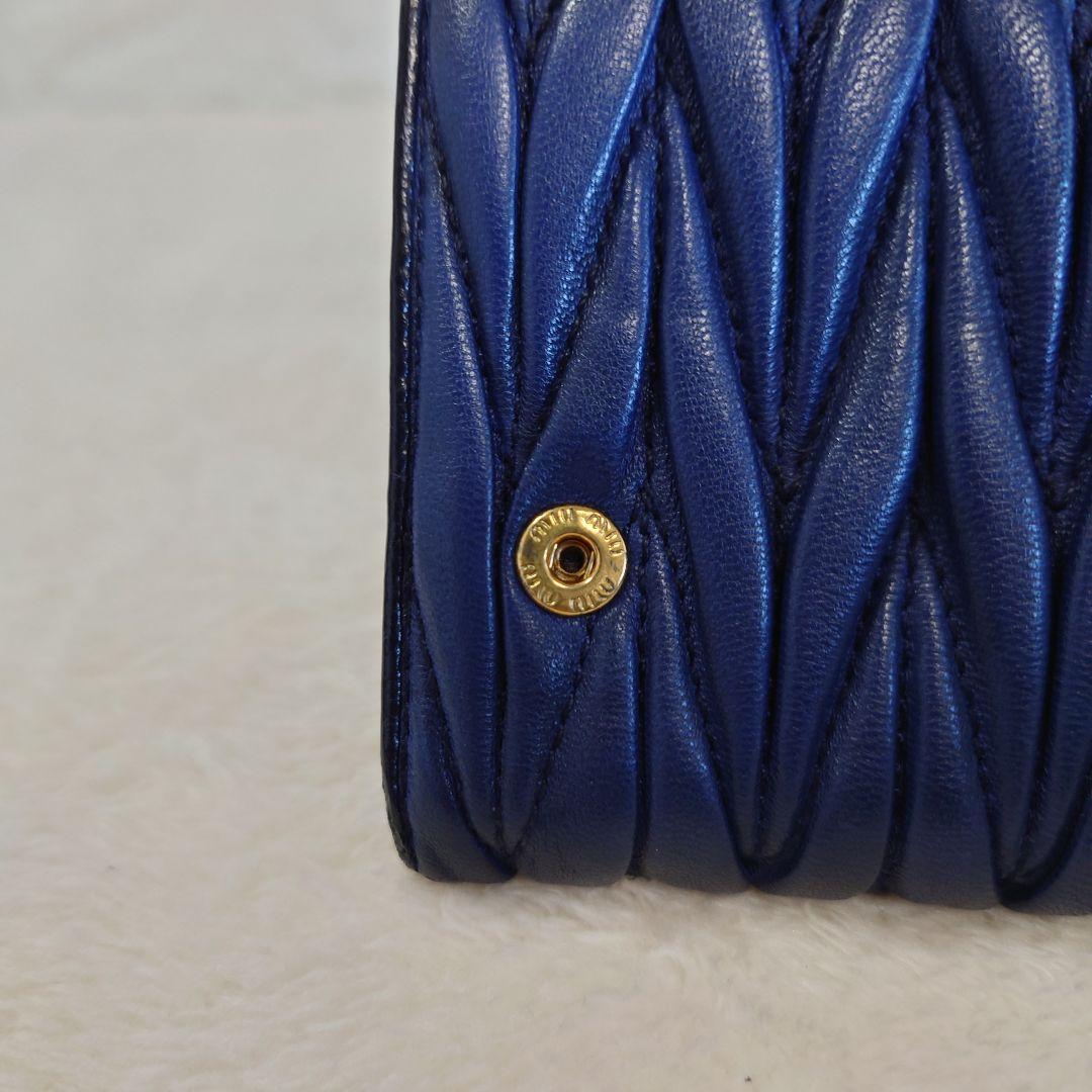miu miu マテラッセ ネイビー 二つ折り長財布 5M1109