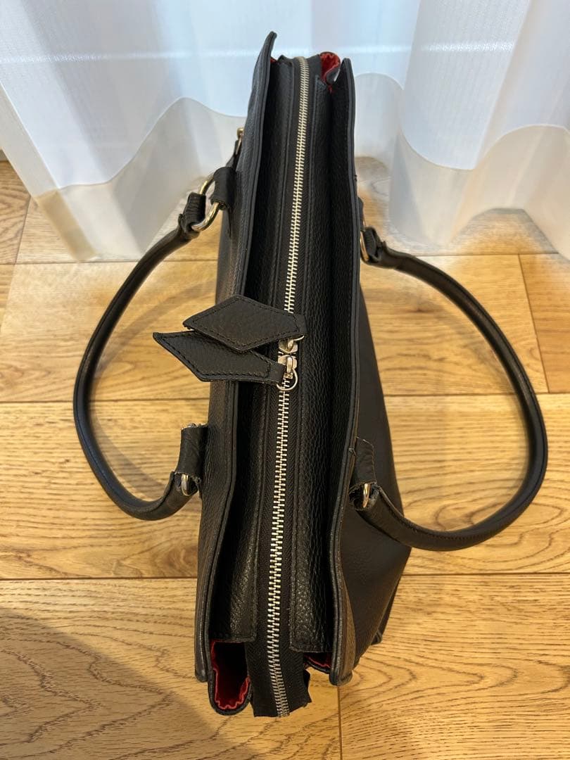 ヴィヴァンウエストウッド　型押しレザーバッグ