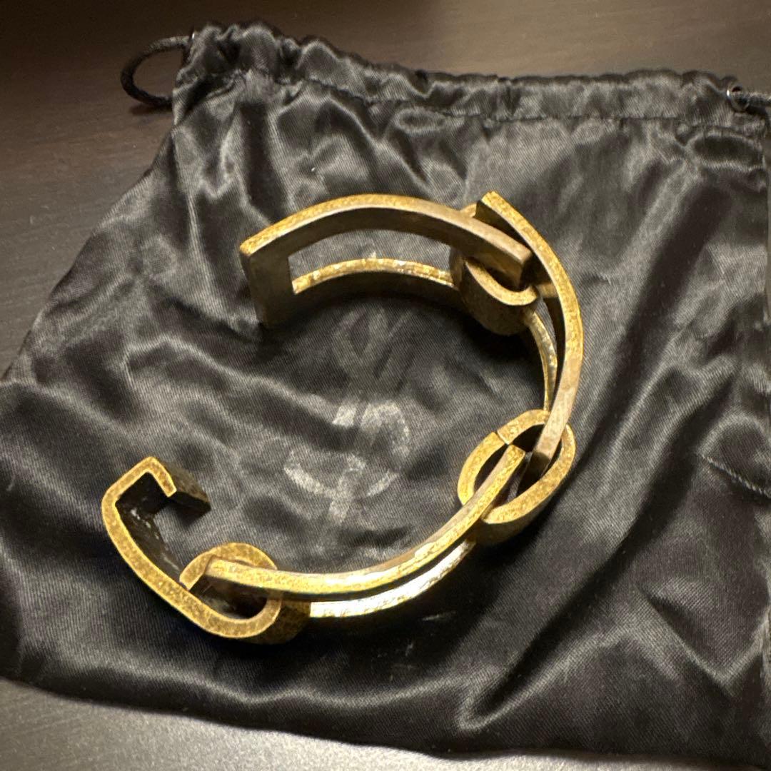 YVES SAINT LAURENT ゴールド ハンマード バングル
