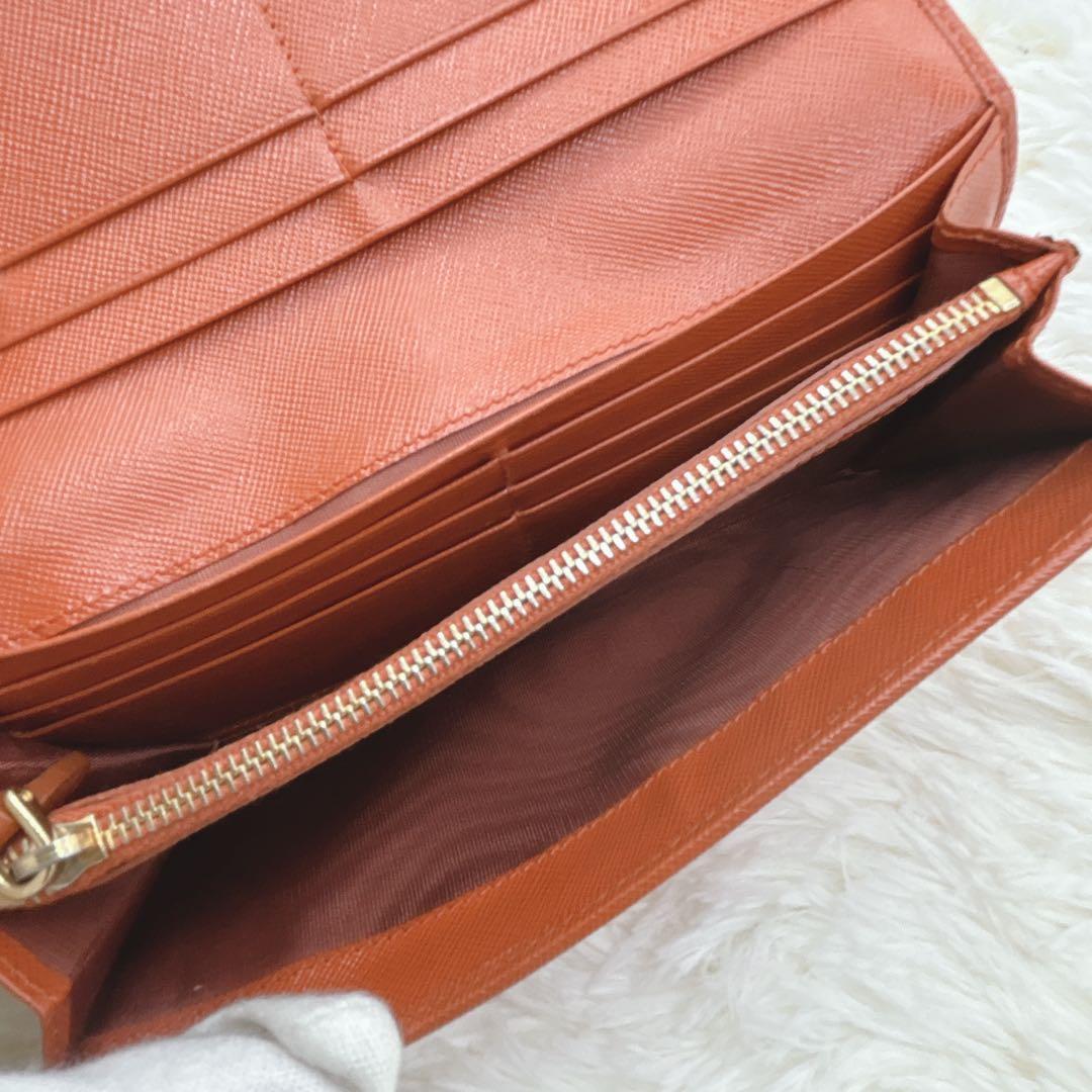 プラダ 長財布 サフィアーノ フィオッコ レッド メタルロゴ リボン