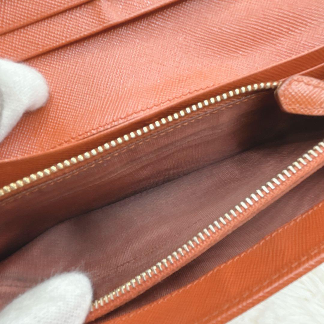 プラダ 長財布 サフィアーノ フィオッコ レッド メタルロゴ リボン