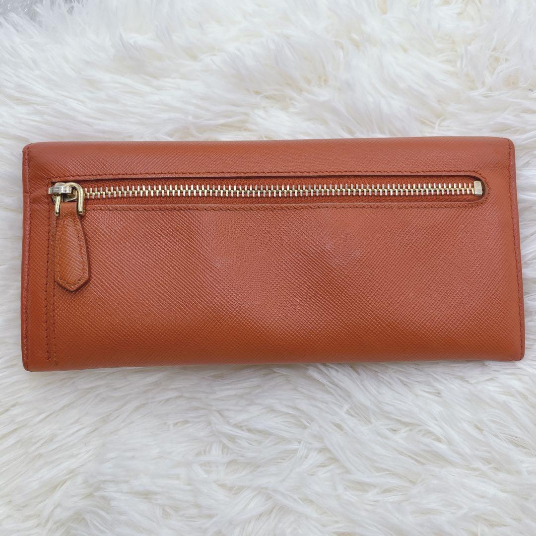 プラダ 長財布 サフィアーノ フィオッコ レッド メタルロゴ リボン