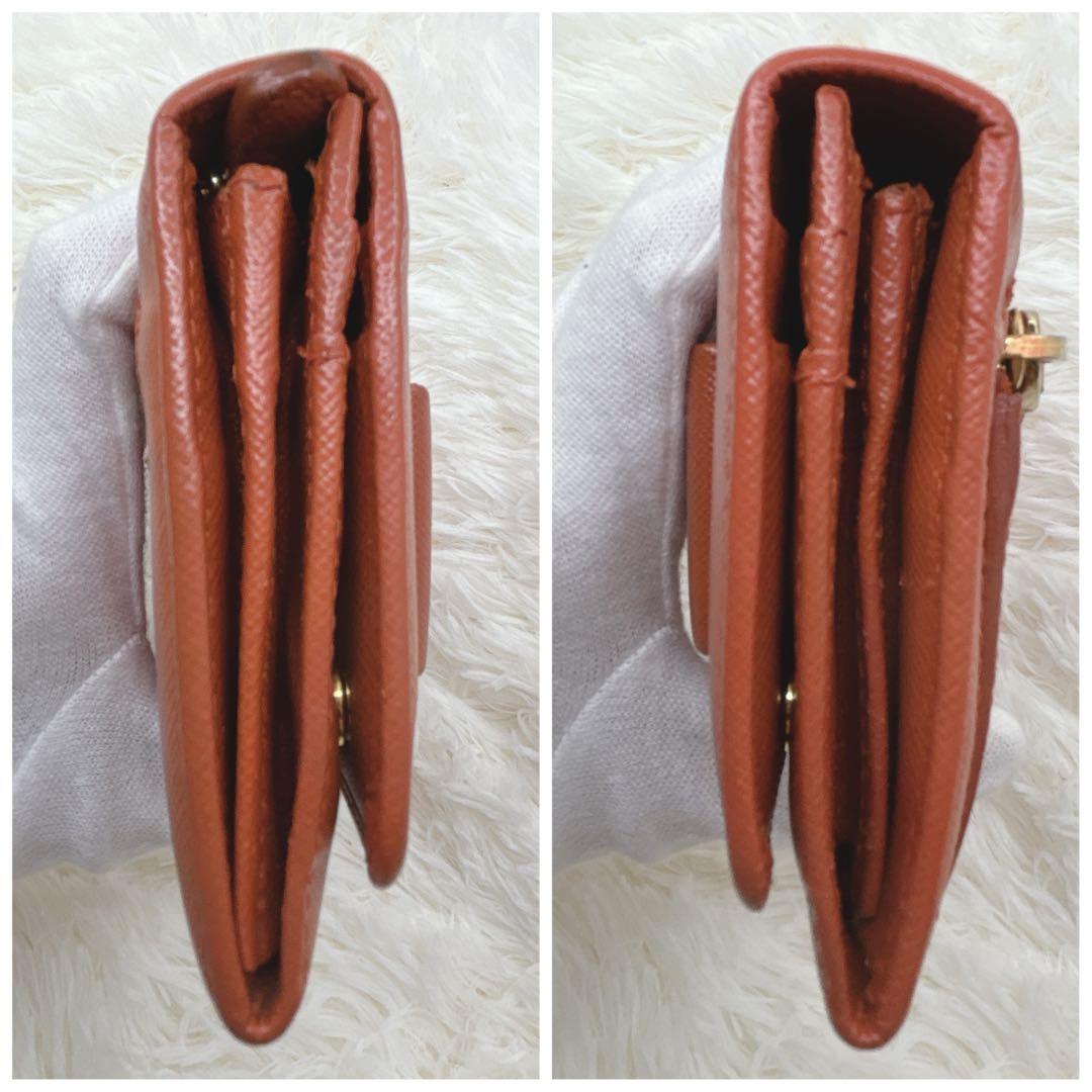 プラダ 長財布 サフィアーノ フィオッコ レッド メタルロゴ リボン