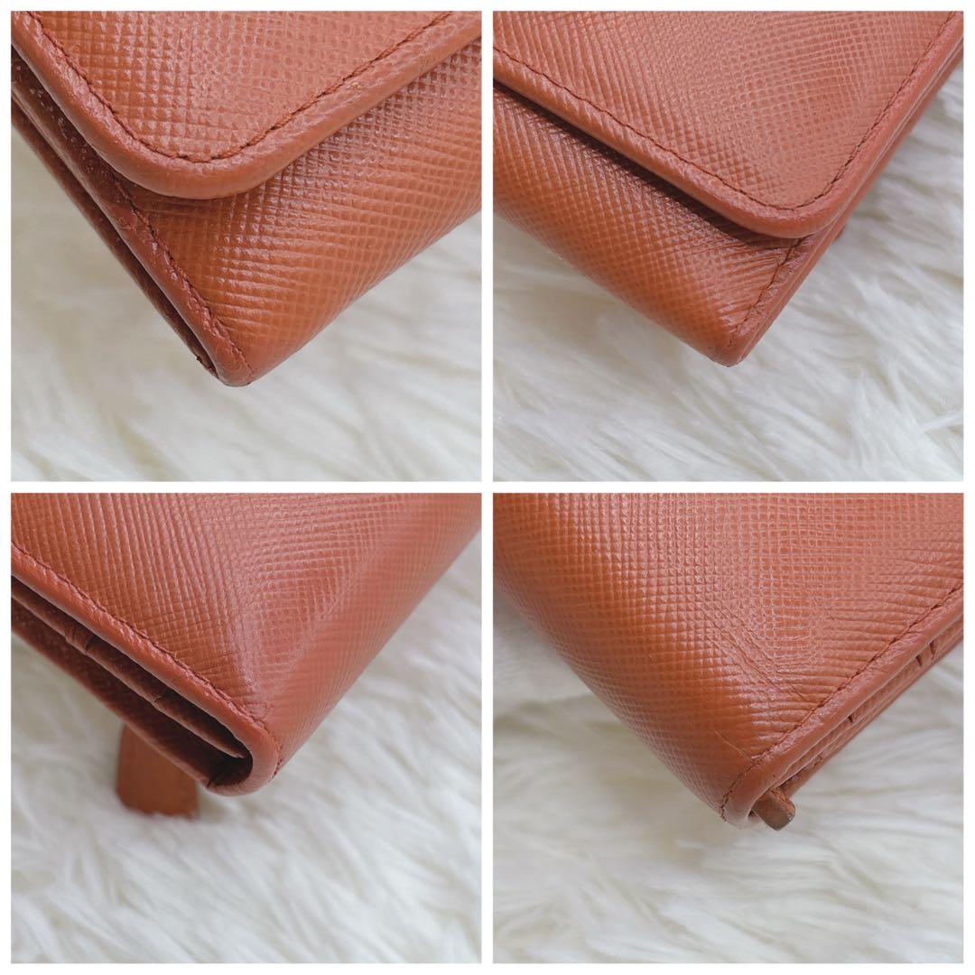 プラダ 長財布 サフィアーノ フィオッコ レッド メタルロゴ リボン