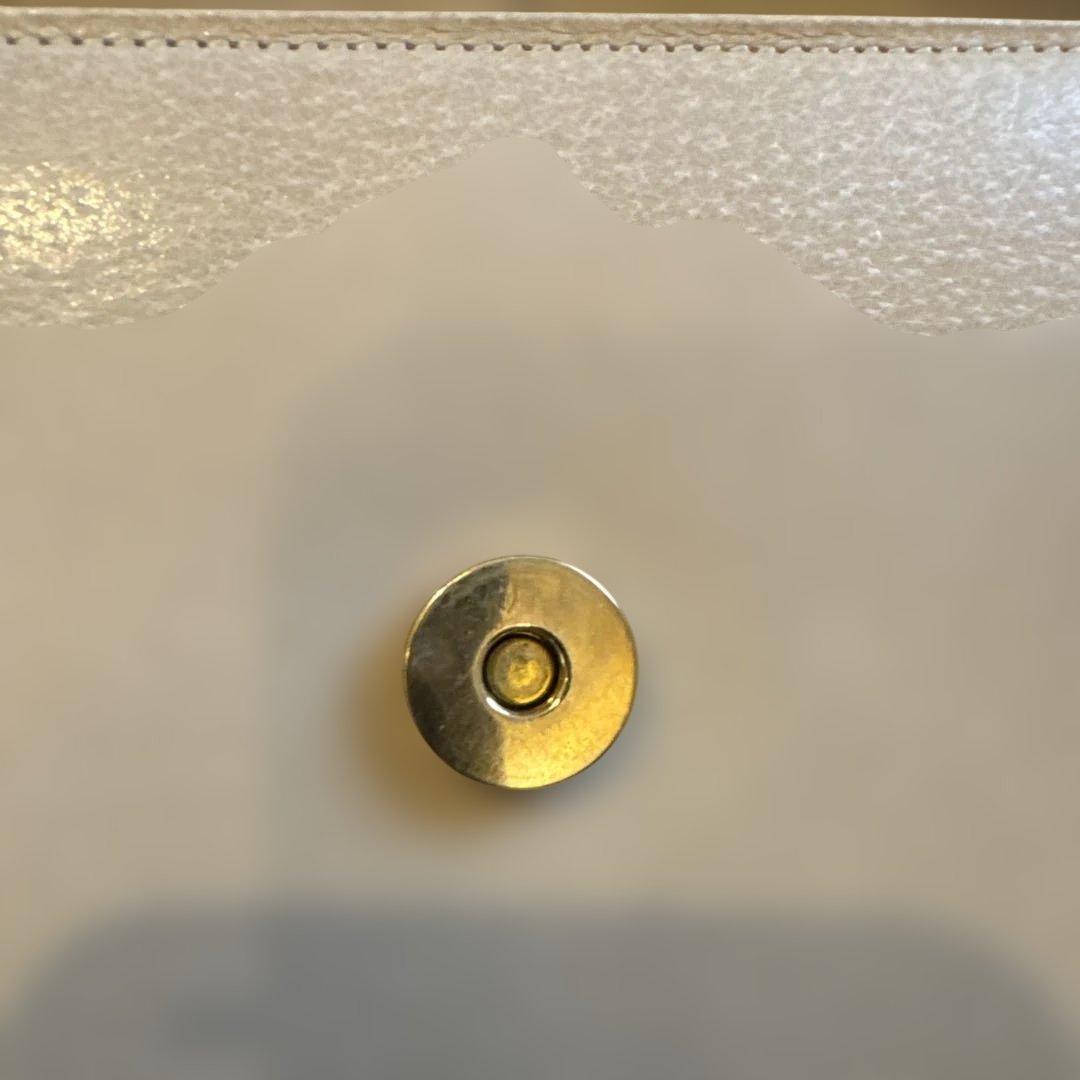 バレンチノ　ヘビ革 クラッチバッグ ホワイト/ゴールド