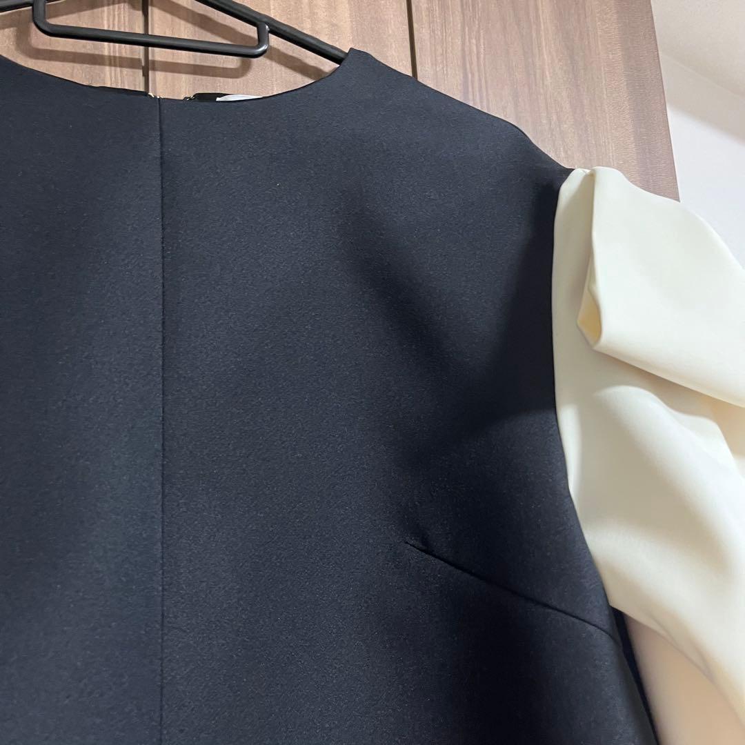 【美品】SEVEN TEN 上品リボンドレープトップスブラック×オフホワイト