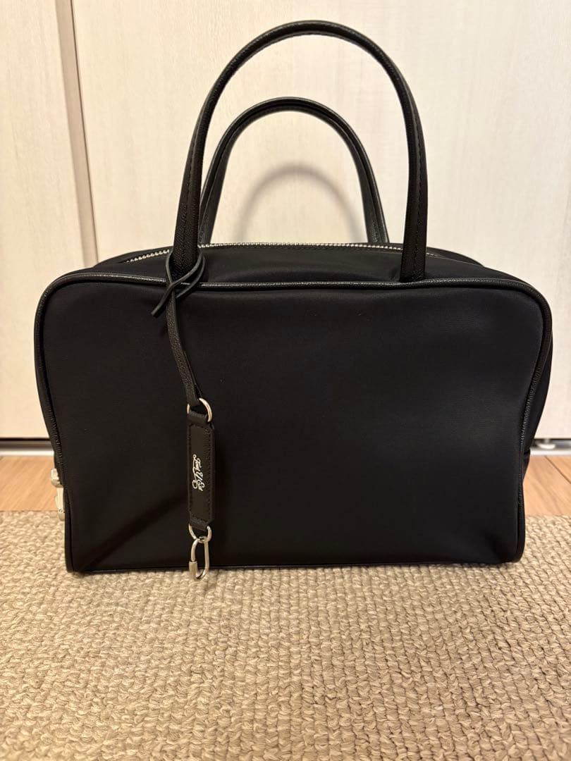 トゥティエ　ロケ ナイロン スモールバッグ