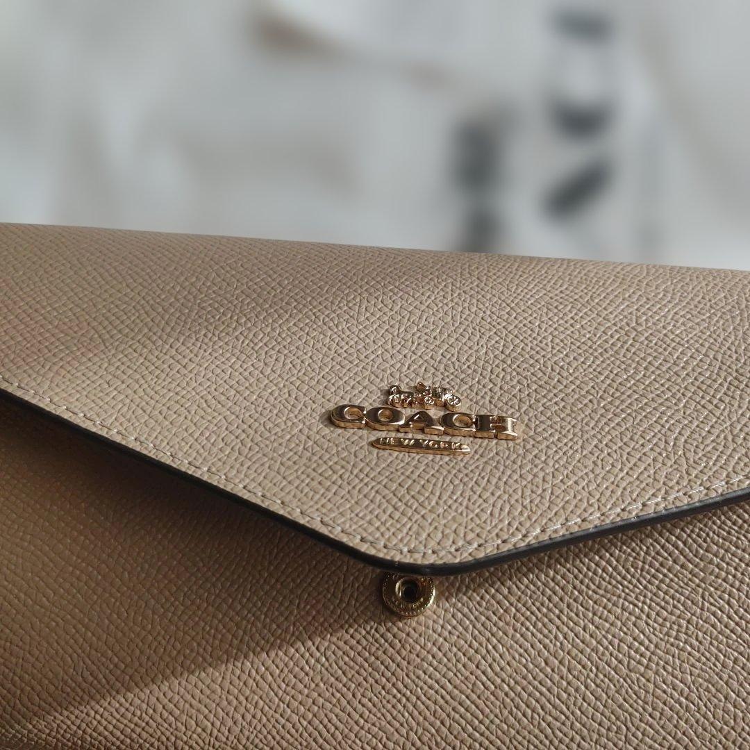 COACH ベージュ エンベロープ型長財布