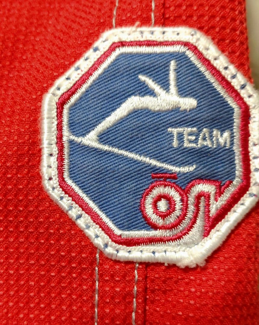 asics Power Austria スキーウェア 赤/白 フード付き