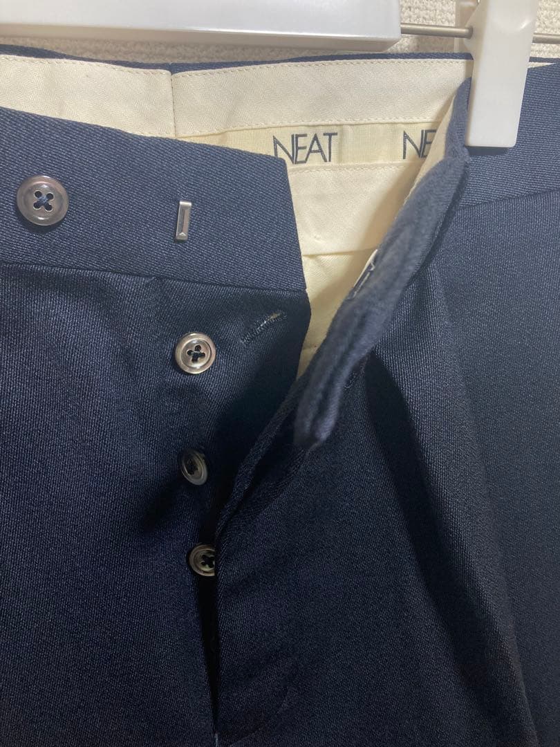 NEAT ウール ネイビー テーパードスラックス