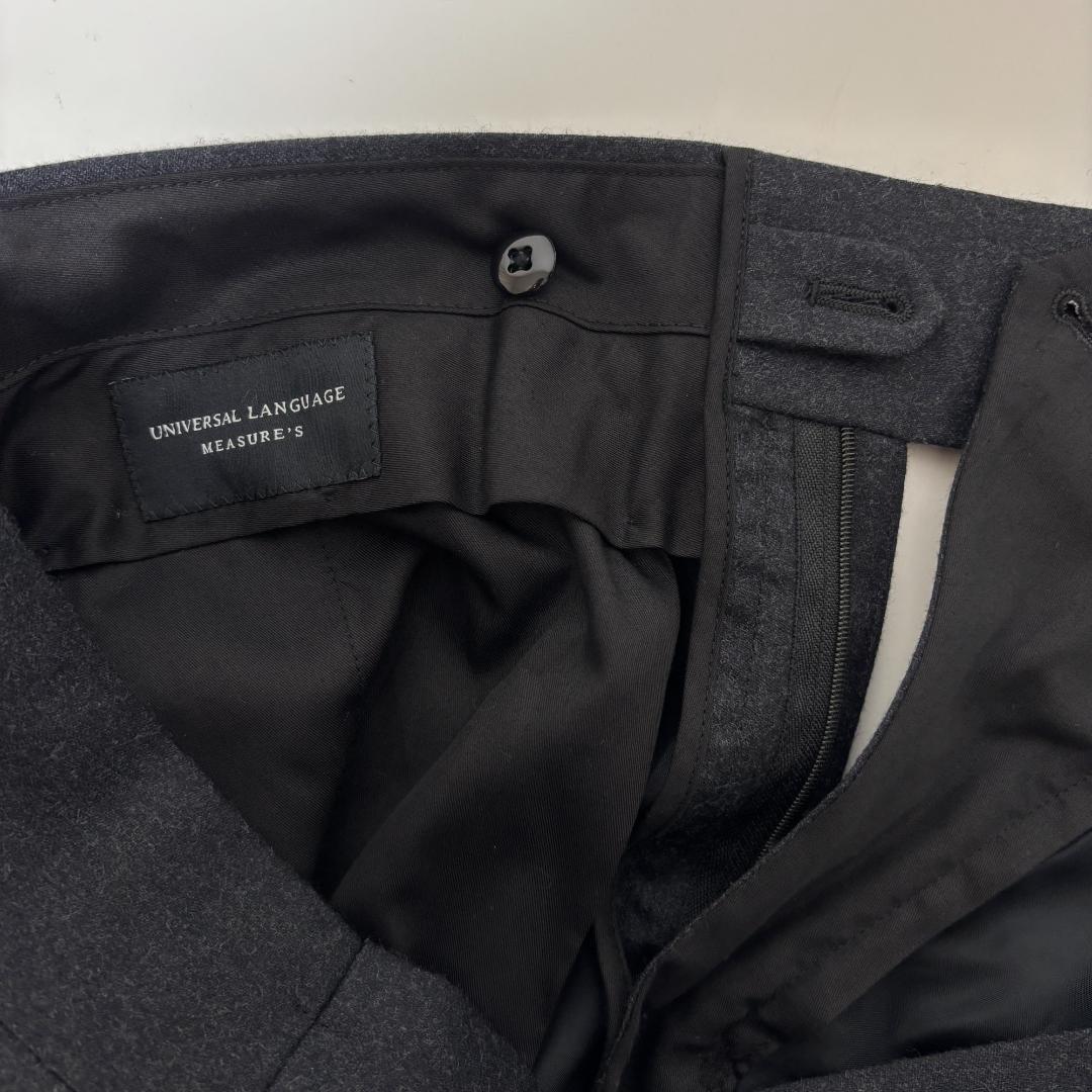 kakiユニバーサルランゲージ スラックス チャコールグレー REDA