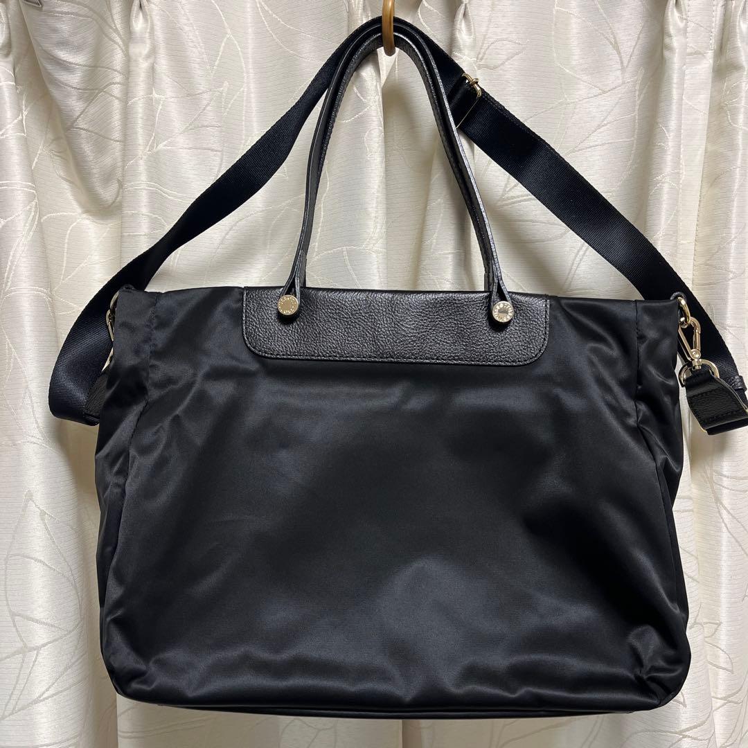 超美品ラシット今期A4入るポケット多数三層構造メタルロゴ2wayバッグ