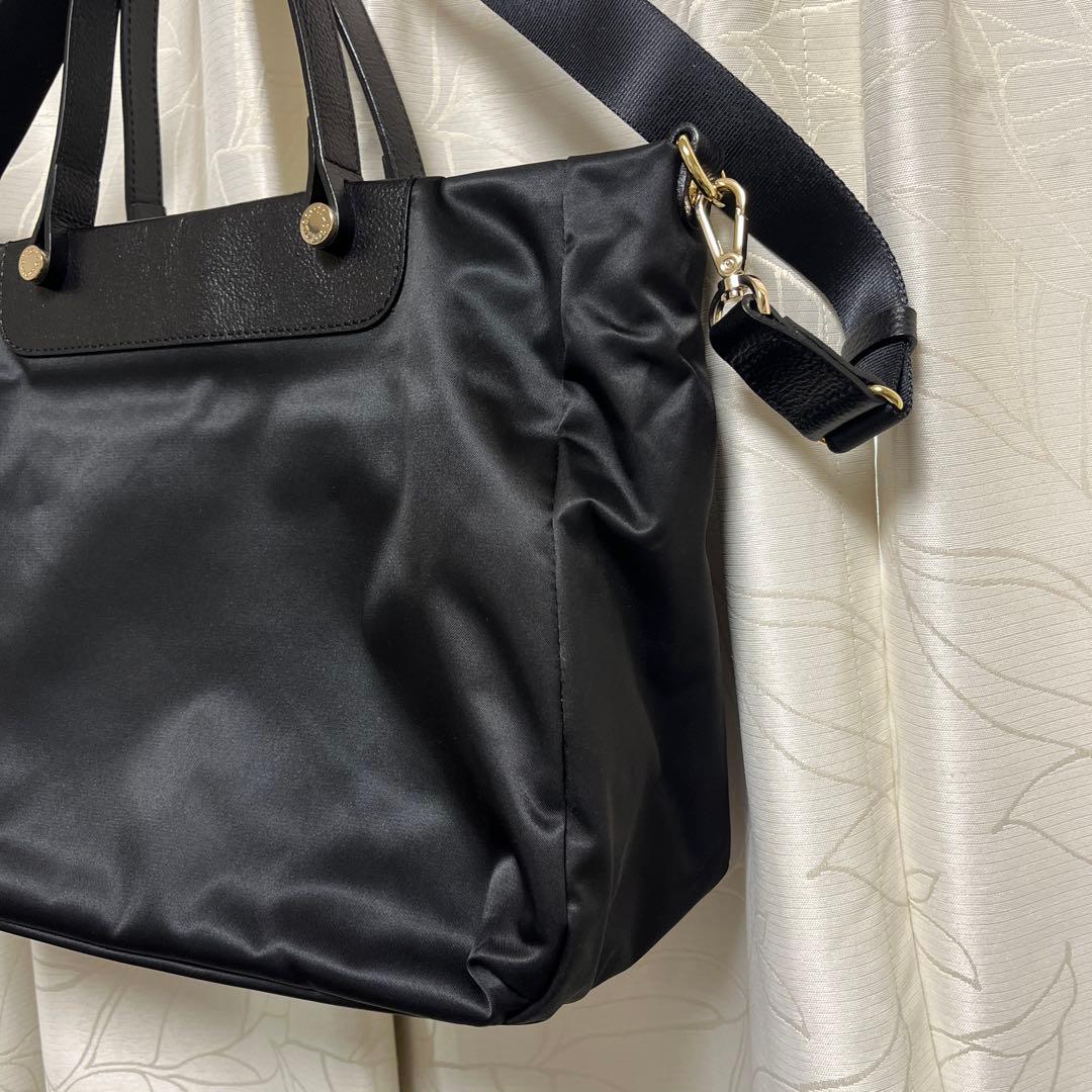 超美品ラシット今期A4入るポケット多数三層構造メタルロゴ2wayバッグ