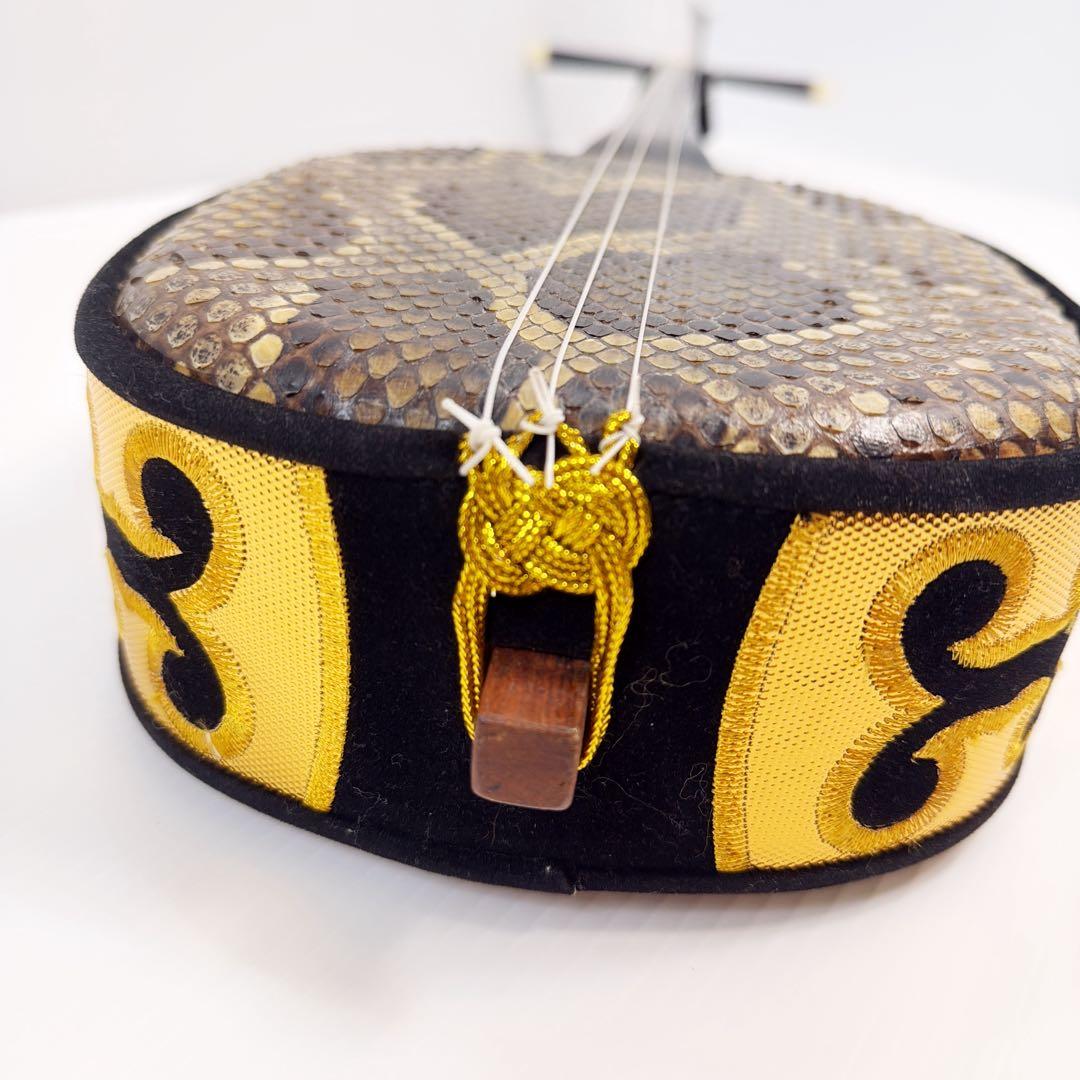 【かずさん専用】沖縄三線 本蛇皮 強化張 真壁型 爪付 ハードケース付 ウマ