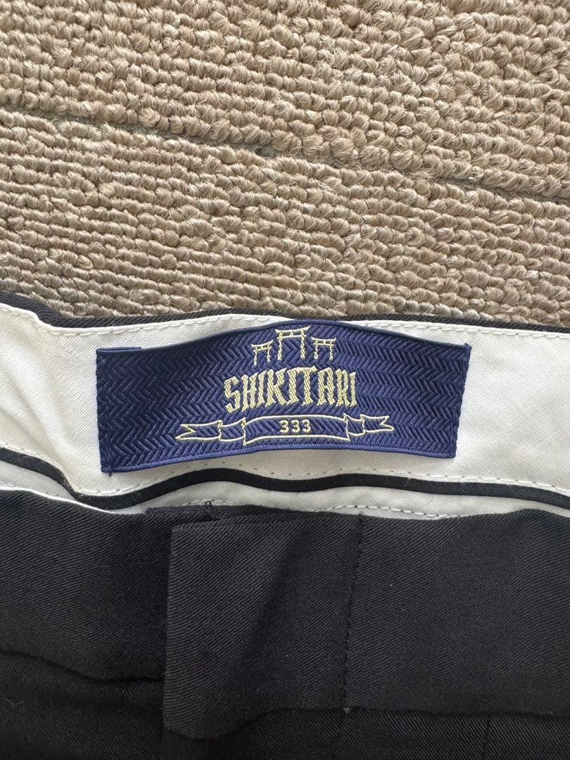 パンツ SHIKITARI MIX TUCK DESIGN WIDE SLACKS