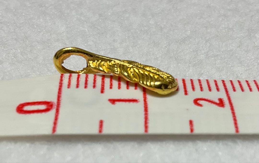 K24　羽根のペンダントトップ　約15mm　足金999刻印