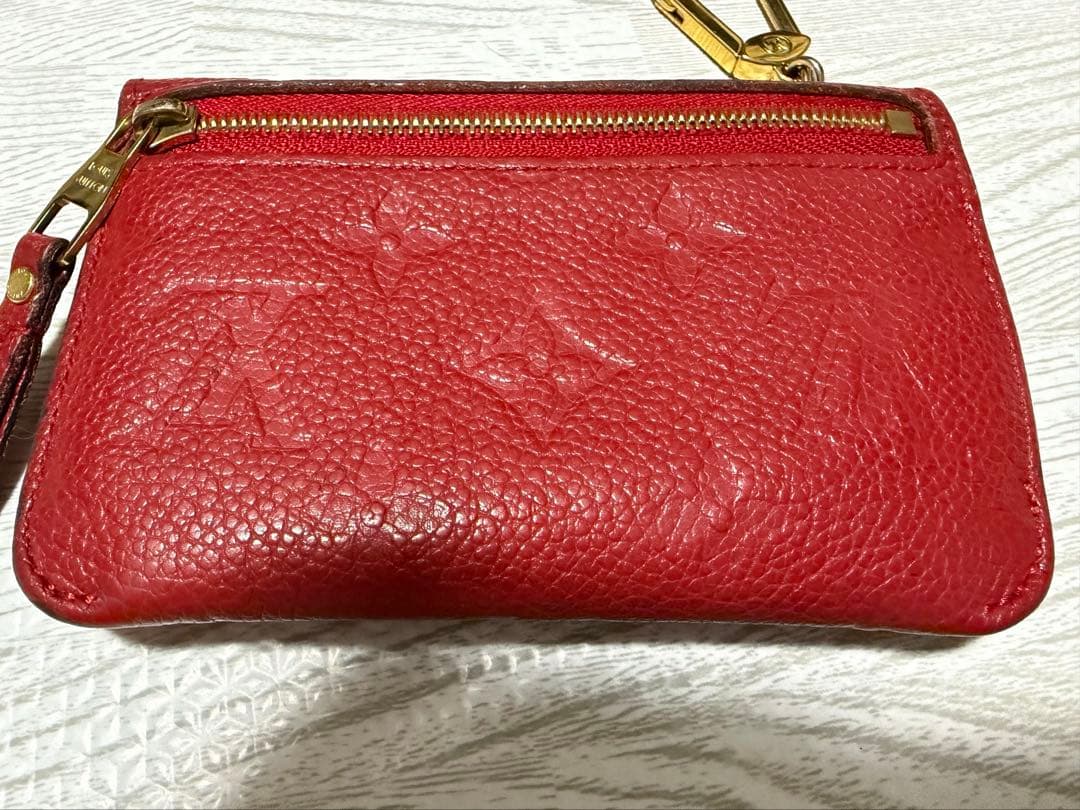 ルイヴィトン モノグラム アンプラント ポシェット クレ レザーケース 赤