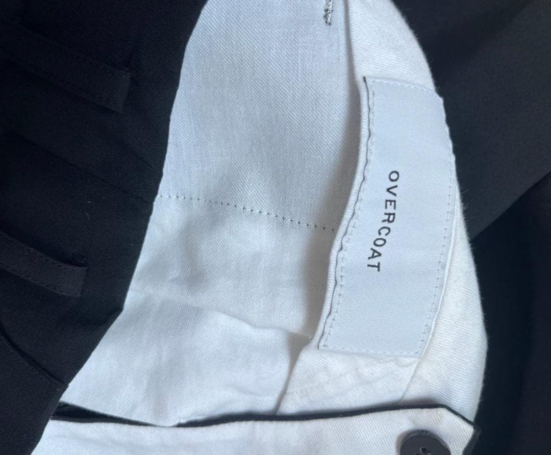 OVERCOAT センタープレス スラックス 黒 1