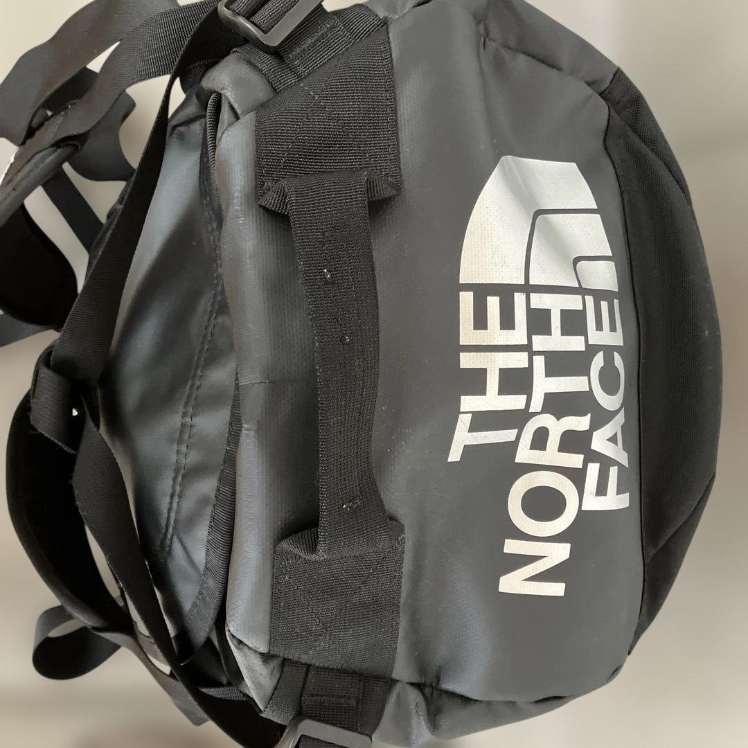 THE NORTH FACE ブラックドラムバッグ