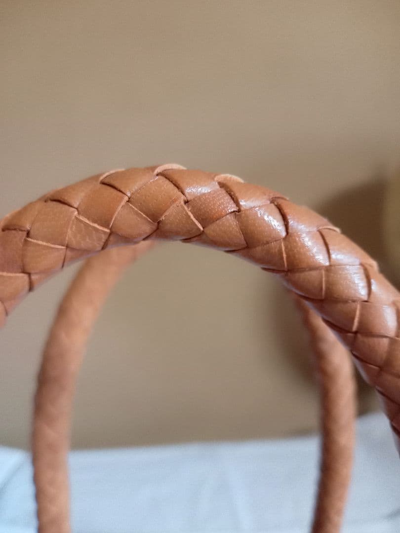 RENキャメル やぎ革メッシュバッグ タッセル付き