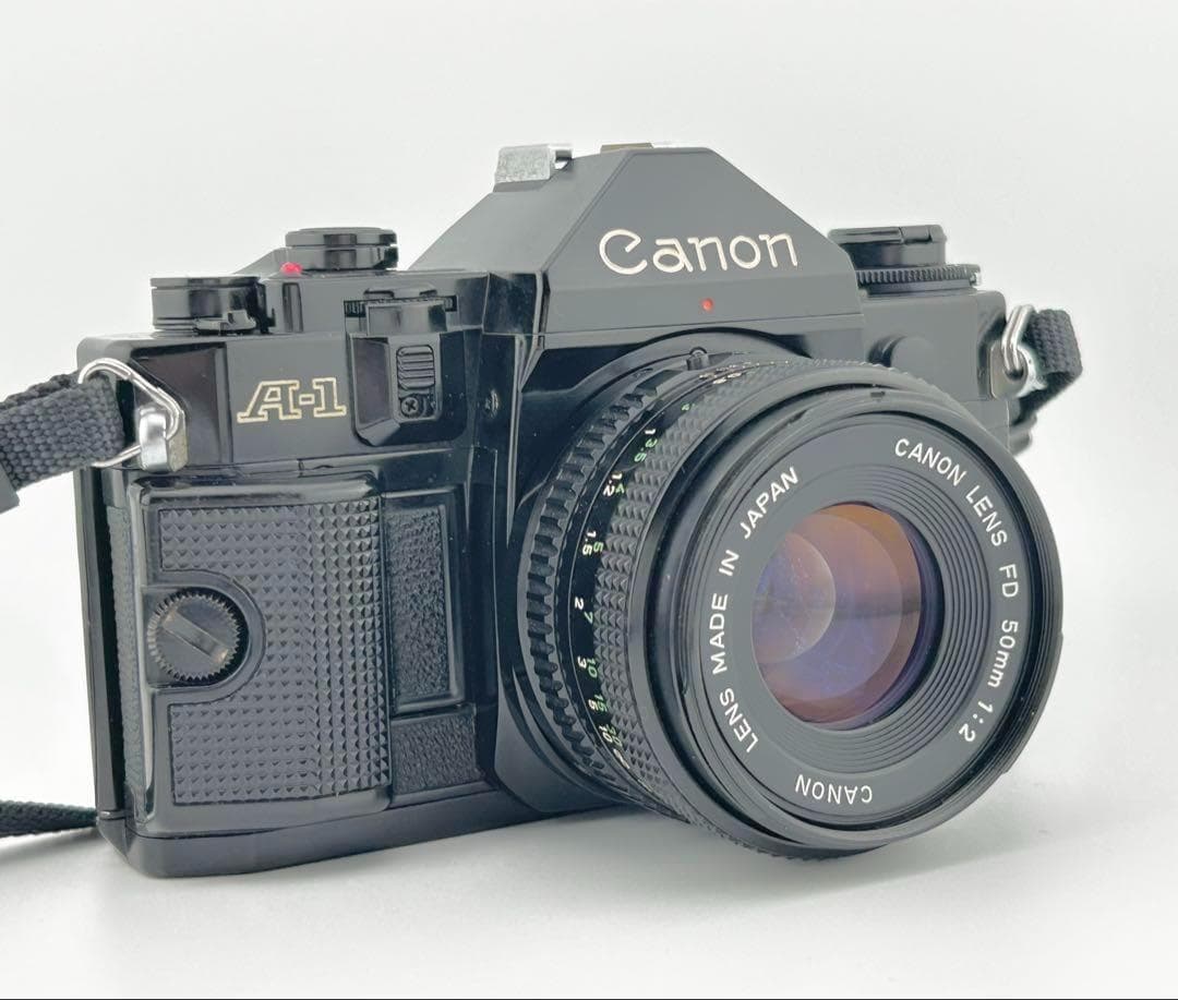 【完動品】　Canon A-1　FD 50mm 1:2 モルト貼替・動作確認済