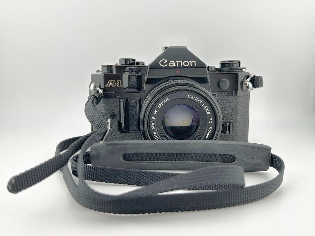 【完動品】　Canon A-1　FD 50mm 1:2 モルト貼替・動作確認済