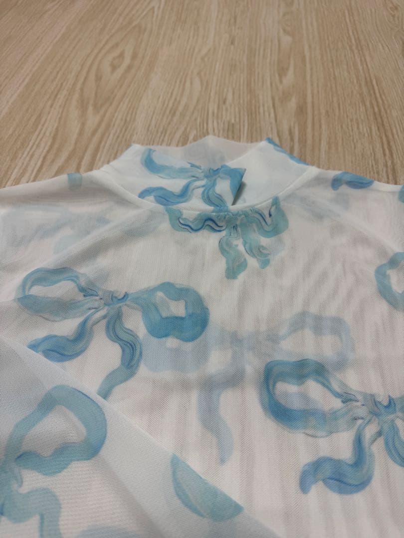 POPPY ベイビーブルーリボンシースルートップス