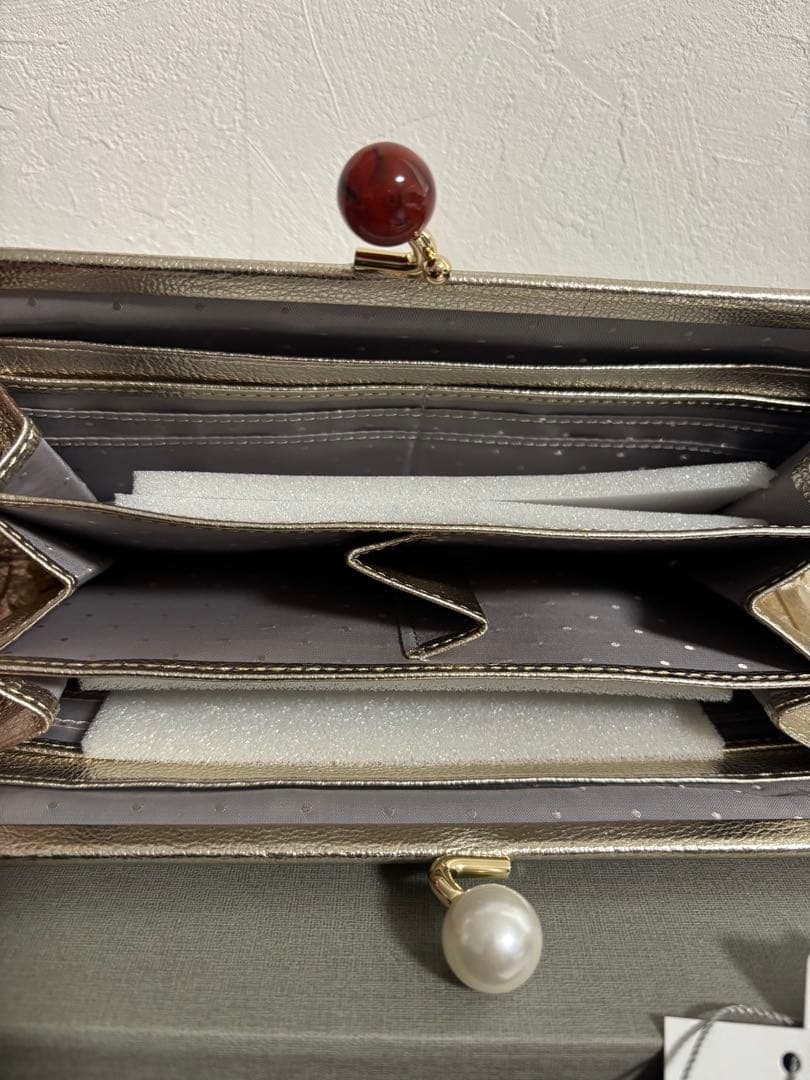【ペルケ perche】アクリル玉がま口長財布 ゴールド