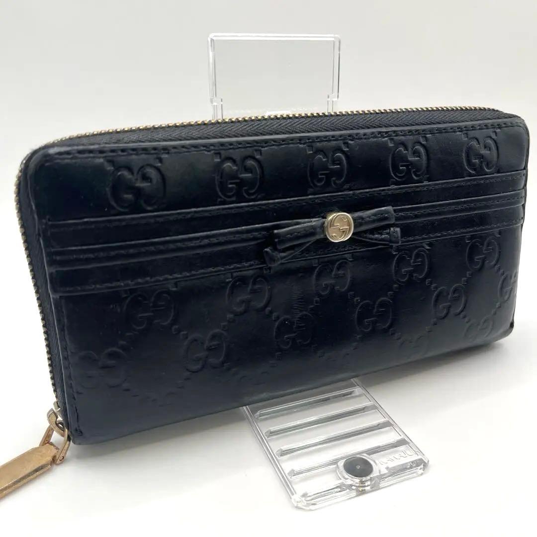 鑑定済　GUCCI グッチ ラウンドファスナー財布 GG リボン シマレザー