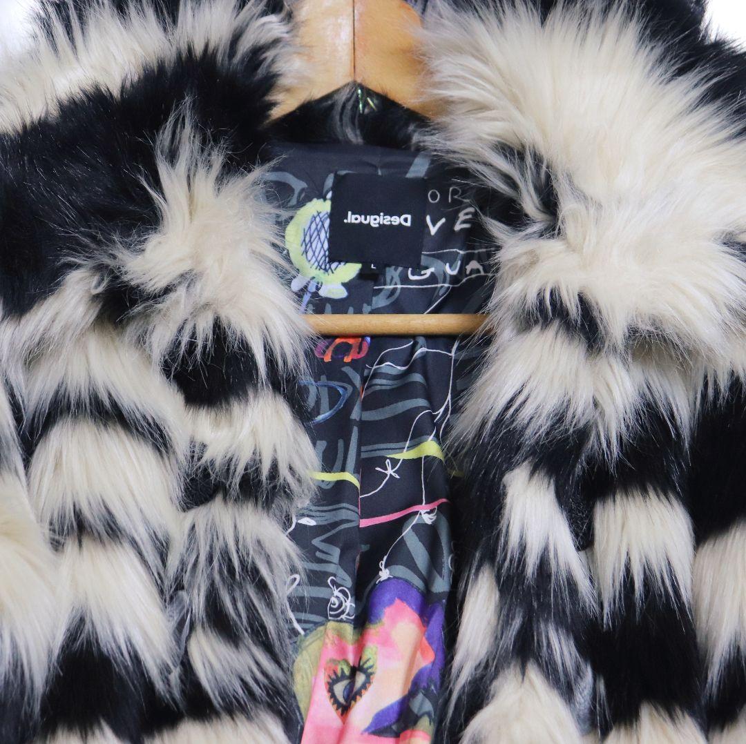 Desigual デシグアル バックデカ目玉 裏地総柄 フェイクファーコート L