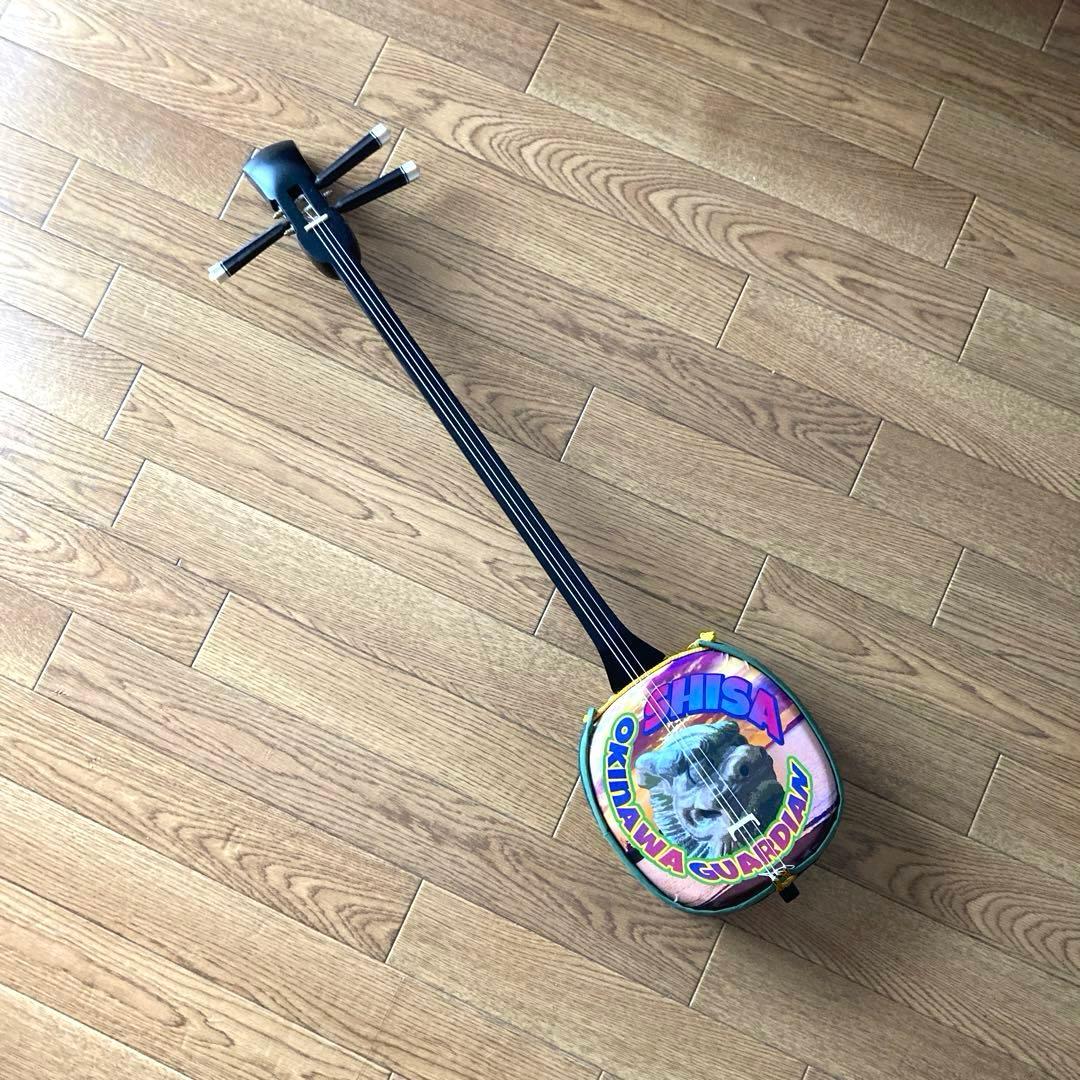シーサーデザインの三線（戻らないカラクイ付き）