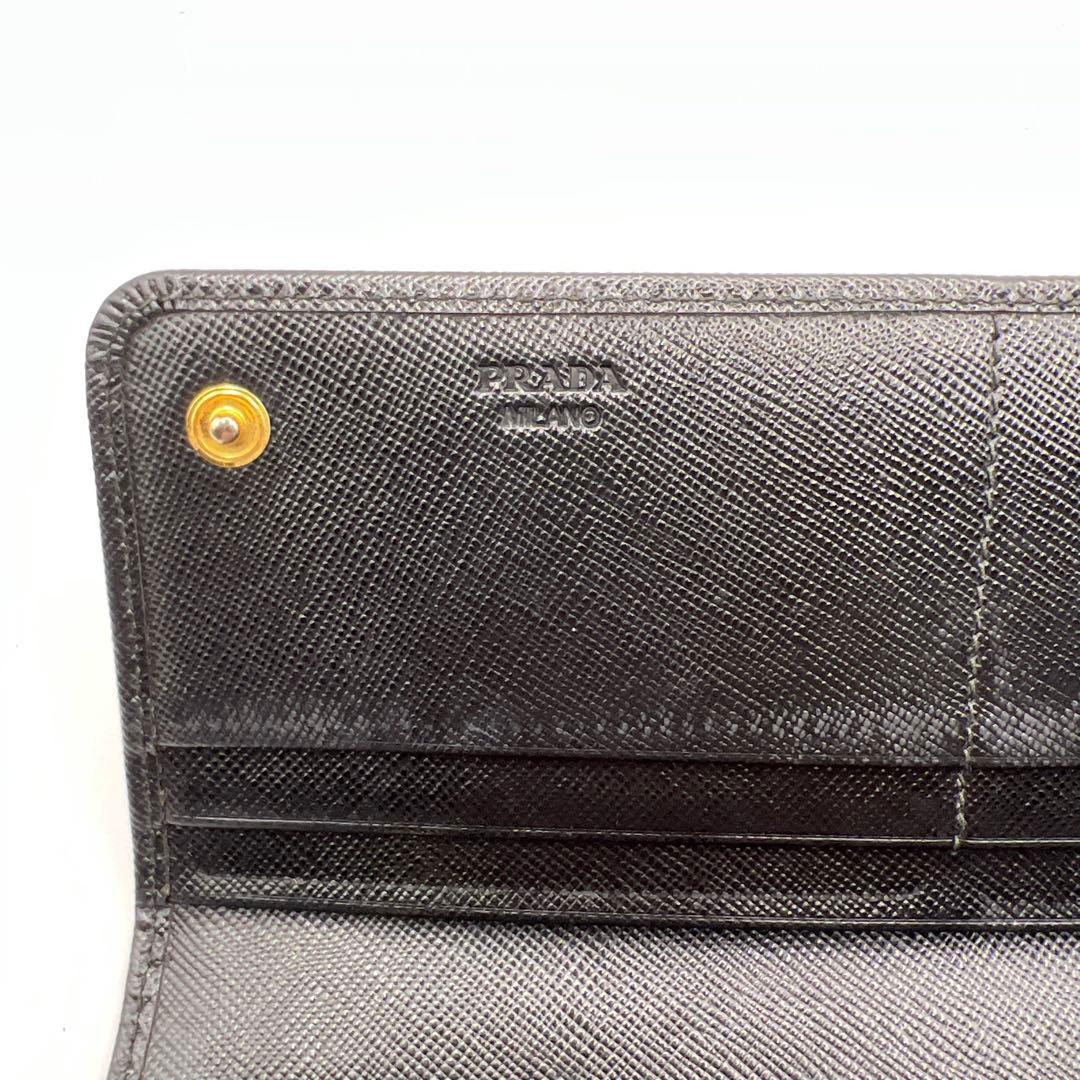 パン子プラダ　リボン　ブラック　長財布　ゴールドロゴ　スナップボタン