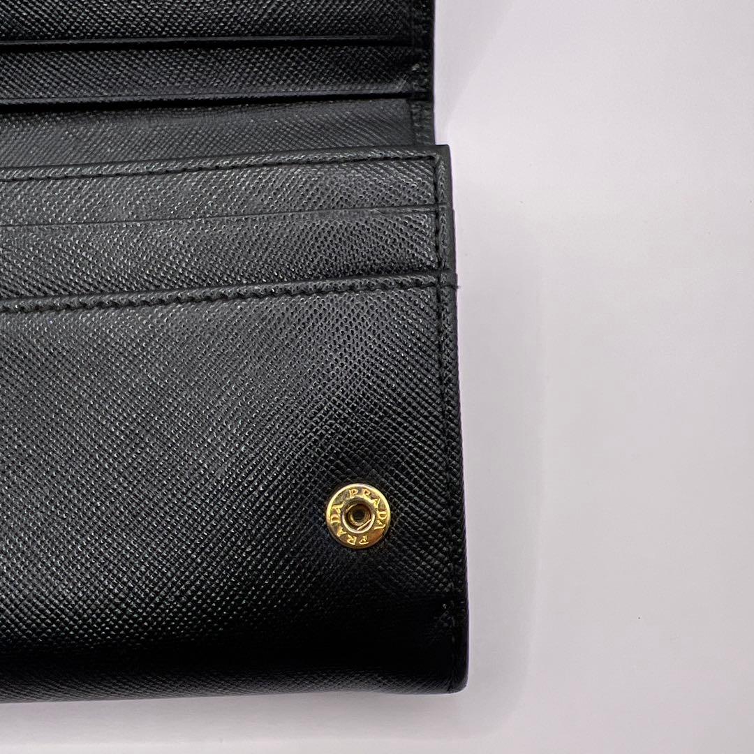 パン子プラダ　リボン　ブラック　長財布　ゴールドロゴ　スナップボタン