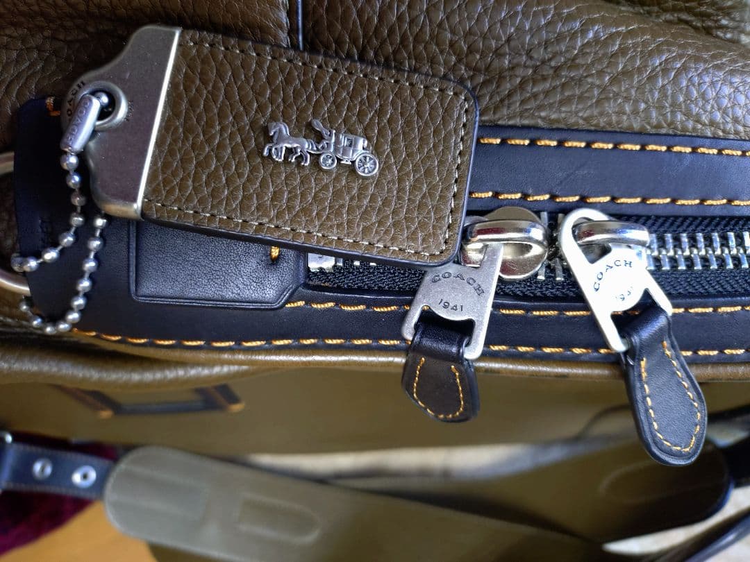 週末お値引き COACH オリーブグリーン レザー リュック