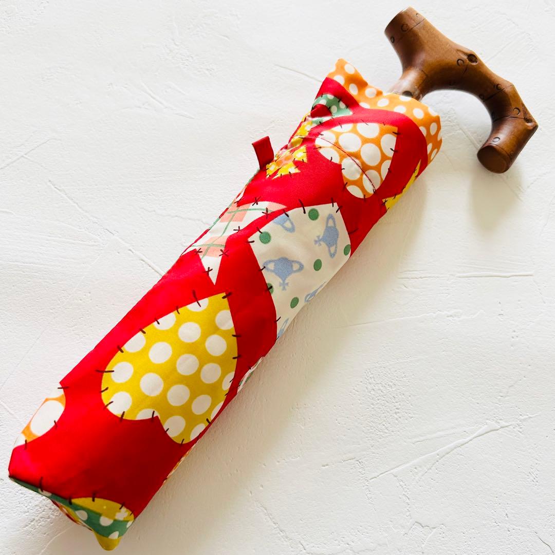 美品軽量ヴィヴィアンウエストウッド折りたたみ傘オーブ柄レッド総柄